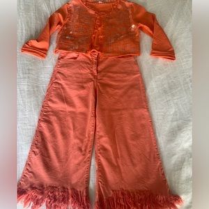 Fringed jeans and matching cardigan